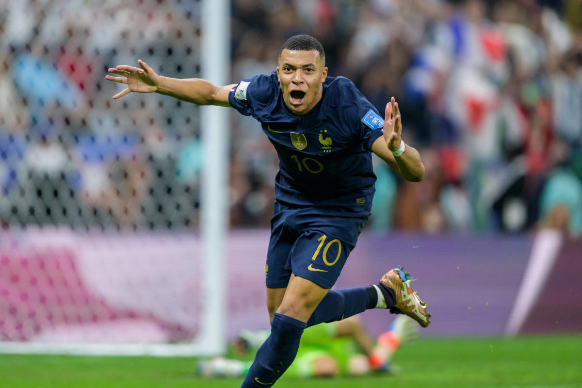 Kylian Mbappe pictured celebrating after scoring his second goal in the 2022 World Cup final